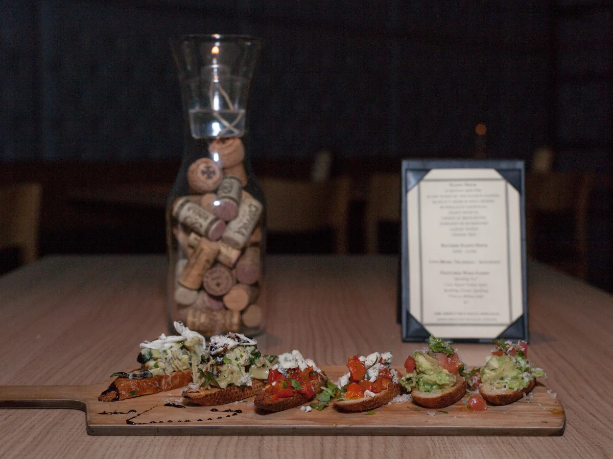 Bruschetta and wine cork carafe at The Toasted Cork